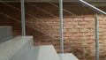 Red brick building with a modern staircase in a loft style with metal railing. Stairs adorn the building. Modern stairwell. Steel Royalty Free Stock Photo