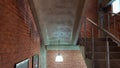 Red brick building with a modern staircase in a loft style with metal railing. Stairs adorn the building. Modern stairwell. Steel Royalty Free Stock Photo