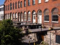 Red brick buildings with wooden bridges attached in Savannah, Gerorgia Royalty Free Stock Photo