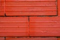 Red brick cinder block and fence facade wall background Royalty Free Stock Photo