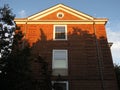 Red Brick Condominium Building at Sunset