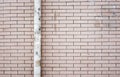 Red brick with dirty pipe wall ,Texture background Royalty Free Stock Photo