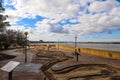 A red brick footpath through Mud Island Park near the vast waters of the Mississippi river and a bridge over the water Royalty Free Stock Photo