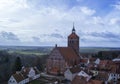 Red Brick Gothic Church in, with Bell Tower in Old Town Royalty Free Stock Photo