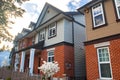 Red brick homes side by side. Row of Typical English Terraced Houses, townhomes.