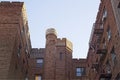 Red brick house with fire escape in Brooklyn