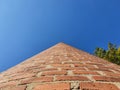 Red brick industrial chimney up in the sky Royalty Free Stock Photo