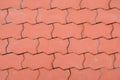 Red brick paving stones on a sidewalk