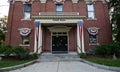 Small town town hall decorated in patriotic bunting photo Royalty Free Stock Photo