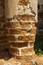 damaged red bricks from the wall of an ancient building Royalty Free Stock Photo