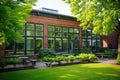 red brick single-room occupancy building with green surroundings