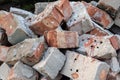 Red brick stack. Old, used building material. Waste recycling and reusable Royalty Free Stock Photo