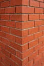 Red brick texture of the corner of the house.New Brick wall for background. House corner, Brick work Royalty Free Stock Photo