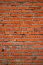 Old red brick wall in an abandoned building