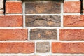 Red brick wall from bricks. Geometric background image from brown bricks. Compound with smooth brickwork Royalty Free Stock Photo