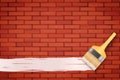 Red brick wall and brush Royalty Free Stock Photo