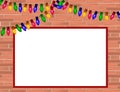 Red brick wall with Christmas lights and frame for some text. Royalty Free Stock Photo