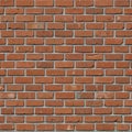 Red brick wall with a classic running bond pattern, featuring horizontal rows of Royalty Free Stock Photo