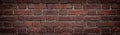 Red brick wall closeup wide texture. Old rough orange brickwork widescreen background Royalty Free Stock Photo