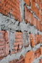 Red brick wall is composed of different bricks in texture Royalty Free Stock Photo