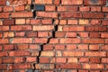 Red brick wall with crack pattern texture. Great for graffiti inscriptions