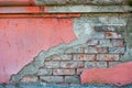 Red brick wall half covered with painted concrete, frame for design Royalty Free Stock Photo