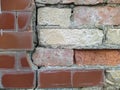 red brick wall and half ruined brown tiles Royalty Free Stock Photo