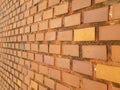 Red brick wall. Horizontal perspective receding into the distance. Royalty Free Stock Photo