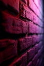 A red brick wall with a light shining through it Royalty Free Stock Photo