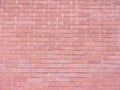 Red brick wall lit by the noonday sun 1 Royalty Free Stock Photo