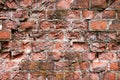 Red brick wall of old building, red brick texture, reliable brickwork masonry with bricklayer Royalty Free Stock Photo