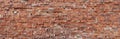 red brick wall pattern for blank background, red-brown bricks pile is waiting for construction Royalty Free Stock Photo