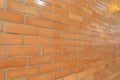 Red brick wall pattern surface texture. Close-up of interior material for design decoration background Royalty Free Stock Photo