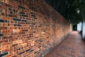 Perspective, side view of old red brick wall texture background Royalty Free Stock Photo