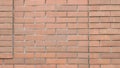 Fragment of a red brick wall with protrusions in the structure Royalty Free Stock Photo