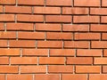 Red brick wall. Smooth silicate long bricks neatly laid out Royalty Free Stock Photo