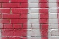Red brick wall splashed with white paint pattern . graffiti texture Royalty Free Stock Photo