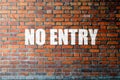 Red Brick wall texture with a word No Entry Royalty Free Stock Photo