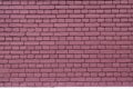 Red brick wall texture grunge background for interior and home design. Wide panoramic photo of the building with good detail. Abst Royalty Free Stock Photo