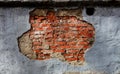 Red brick wall texture under peeling plaster, modern style background, architecture detail Royalty Free Stock Photo