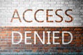 Red Brick wall texture with a word Access Denied Royalty Free Stock Photo