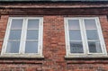 Red brick wall textures with windows at historical and industrial buildings Royalty Free Stock Photo