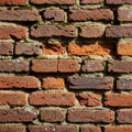 The mortar used is light gray, providing contrast against the darker bricks Royalty Free Stock Photo