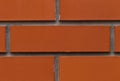 Old wall of red briks tiled background, regular block texture. Royalty Free Stock Photo