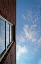 Red brick wall and window in sky Royalty Free Stock Photo