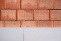 Red brick wall during the works connected with the insulation of polystyrene Royalty Free Stock Photo