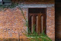 Red brick walls and antique wood windows Royalty Free Stock Photo