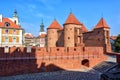 Red brick walls and towers of Warsaw Barbican, Poland