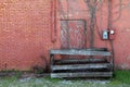 Red brick warehouse back shipping doors boarded unused Royalty Free Stock Photo