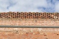 Red Bricked with Honeycombe Topped Wall